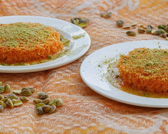 Knafeh Nabulsi kunafa dessert topped with pistachios at Yafa Café in Winnipeg, MB