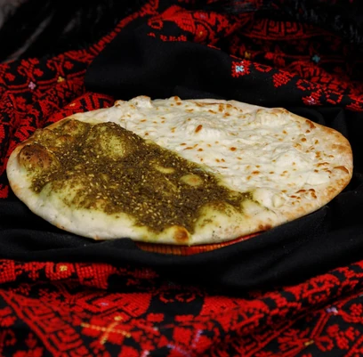 Zaatar and cheese manakeesh baked fresh at Yafa Café on Portage Avenue in Winnipeg
